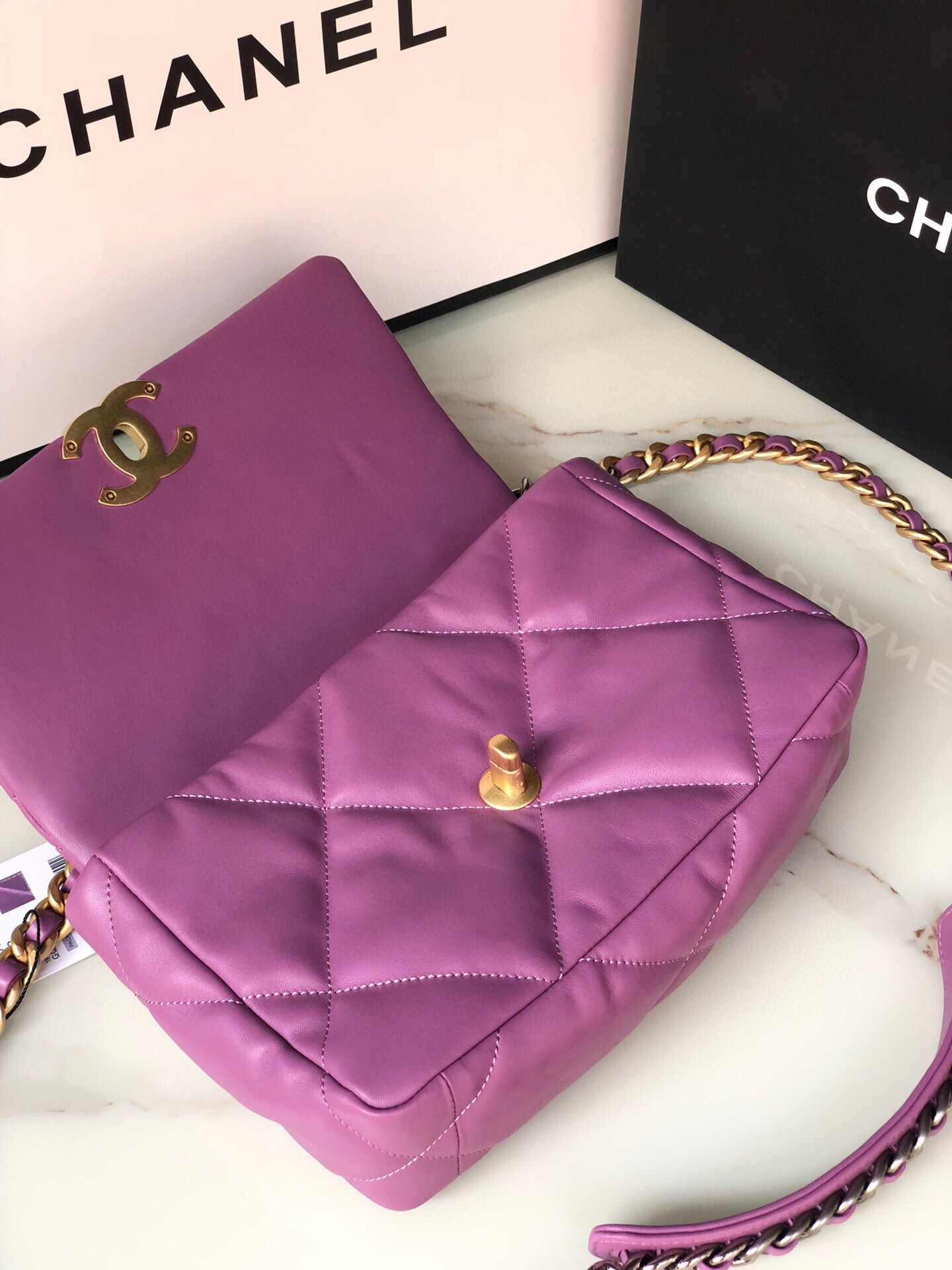 Ch*el 19 handbag shiny leather, gold-tone, silver-tone & ruthenium-finish metal purple 6.2 × 10.1 × 3.5 in