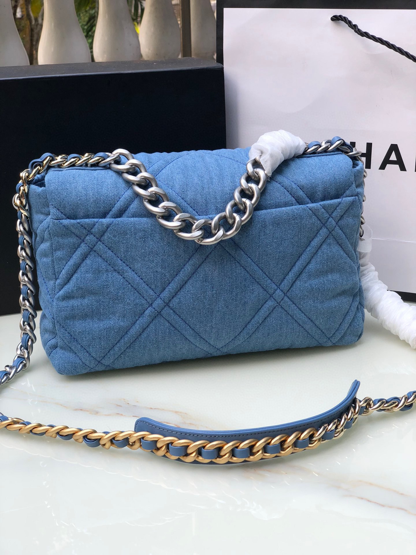 Ch*el 19 large handbag, gold-tone, silver-tone & ruthenium-finish metal blue 7.8 × 11.7 × 3.9 in