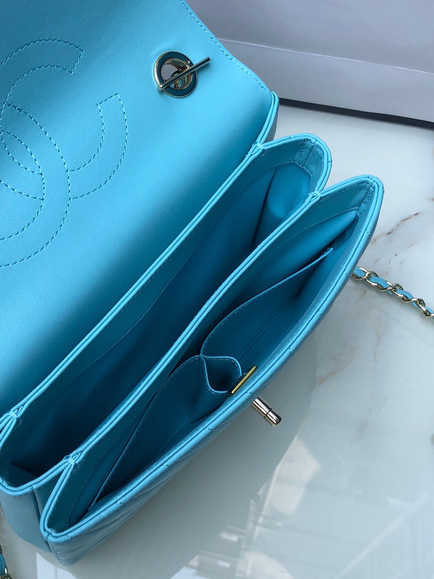 Ch*el flap bag with top handle 6.6 × 9.8 × 4.7 in