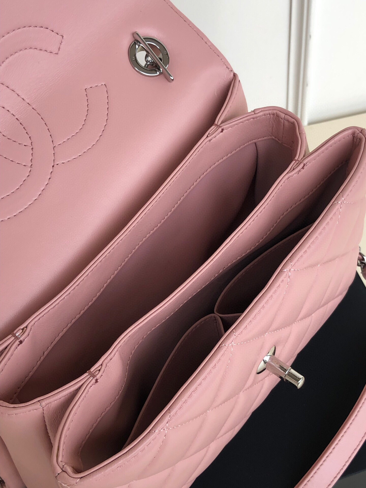 Ch*el flap bag with top handle 6.6 × 9.8 × 4.7 in