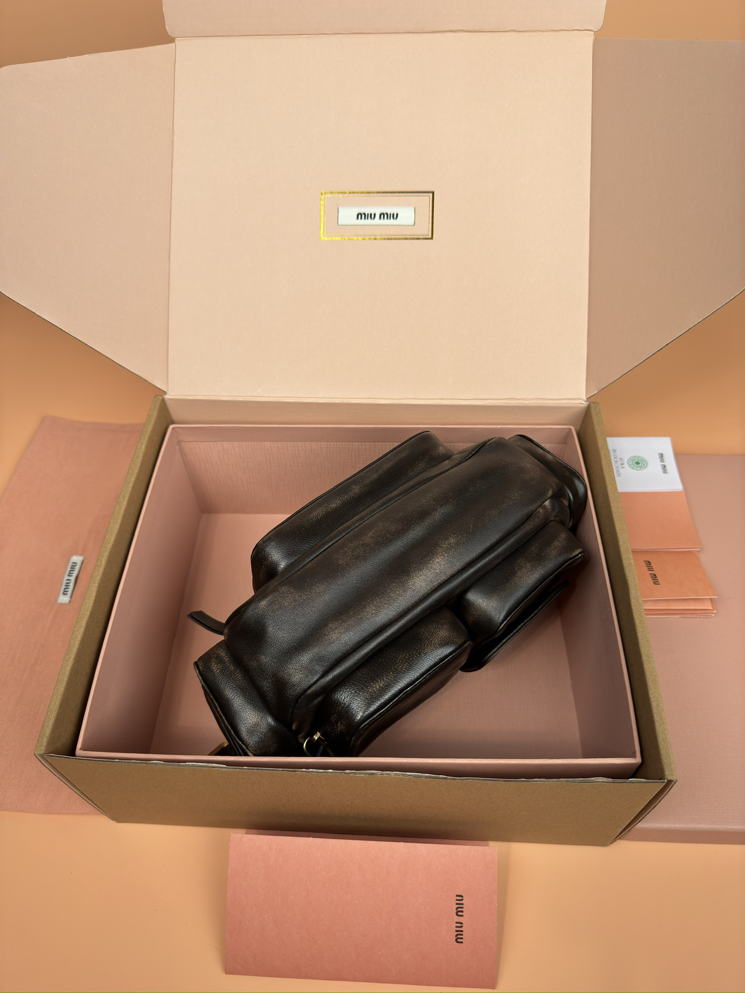 Miu Miu Hobo Nappa leather pocket bag 12x21x6cm