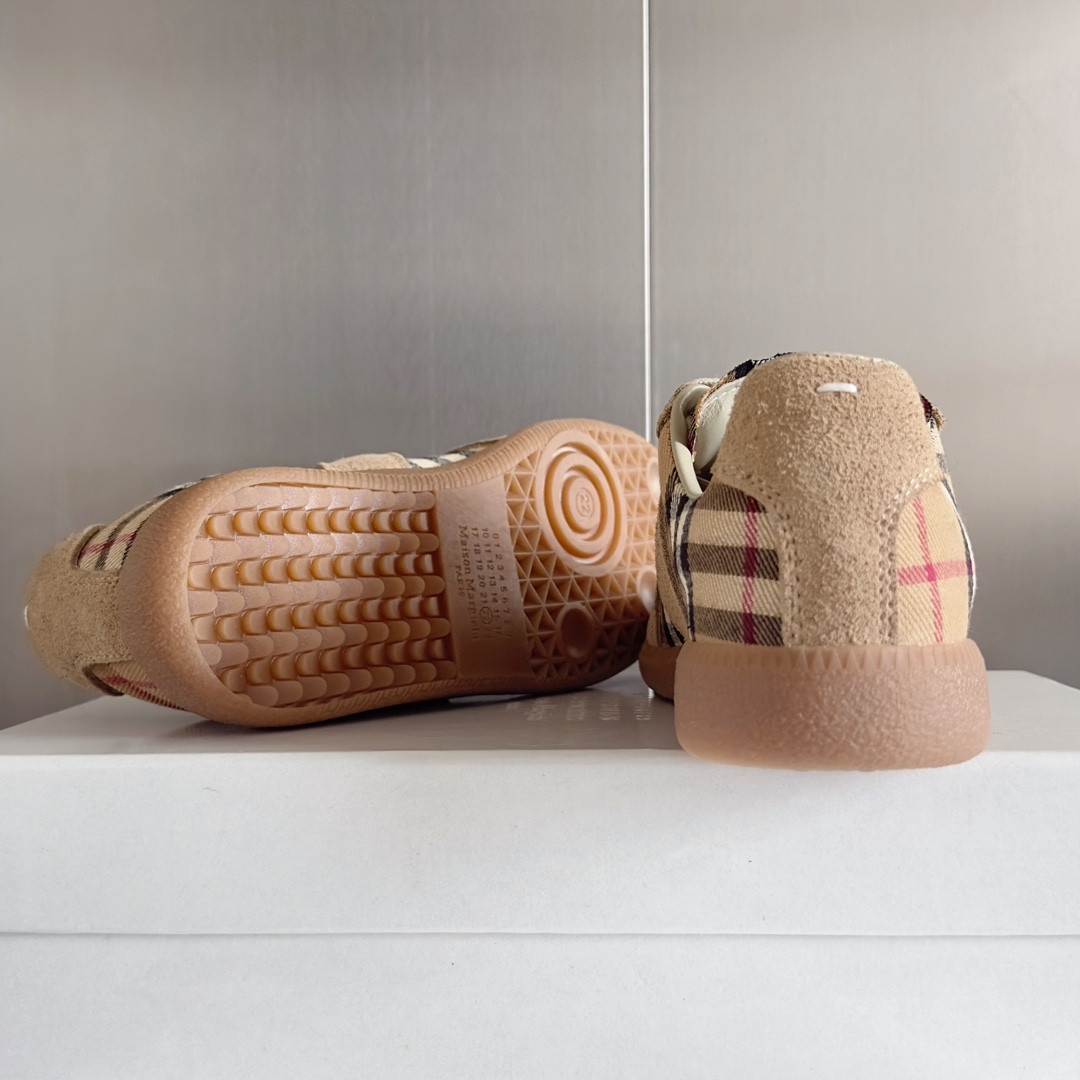 ua ma*s*n Ma*i*la mm6 sneakers